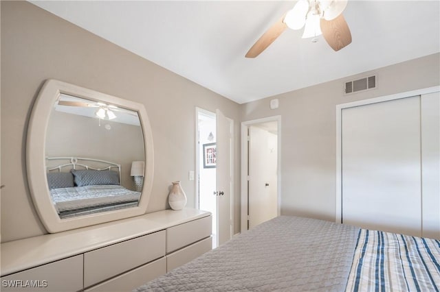 bedroom featuring ceiling fan and a closet