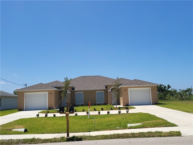 ranch-style home featuring a front yard and a garage