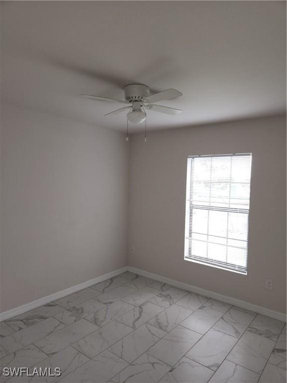 unfurnished room featuring ceiling fan