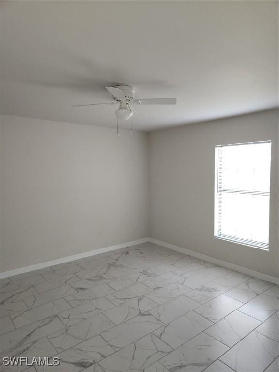 empty room featuring ceiling fan