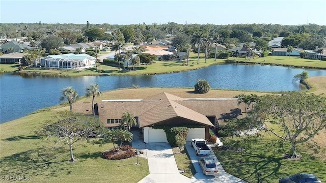 bird's eye view with a water view