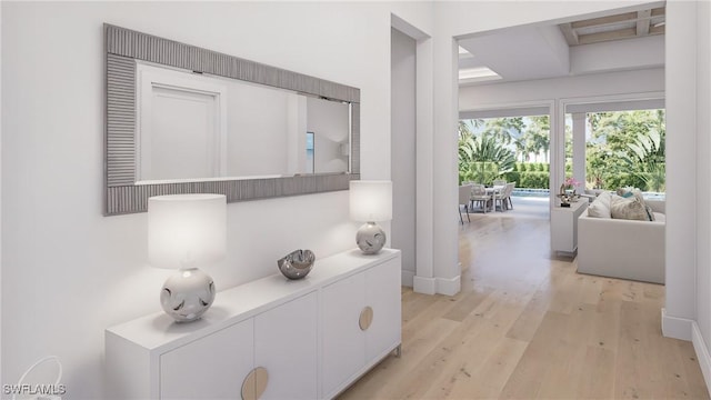 541 106th Ave N, Naples, FL 34108 - hall featuring light wood-style flooring, beam ceiling, and baseboards