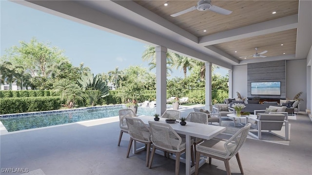541 106th Ave N, Naples, FL 34108 - view of patio featuring a ceiling fan, an outdoor living space, an outdoor pool, and outdoor dining area