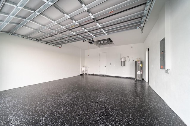 garage with electric panel, a garage door opener, and water heater