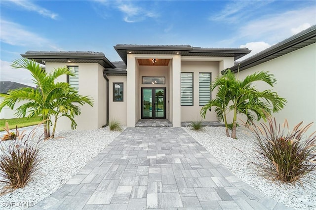 doorway to property with french doors