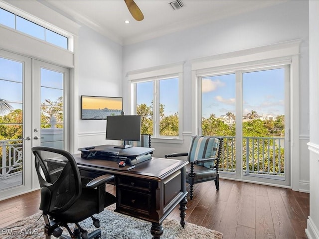 office space featuring ornamental molding, dark hardwood / wood-style floors, ceiling fan, and french doors