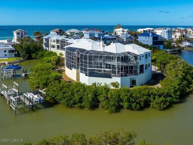 drone / aerial view featuring a water view