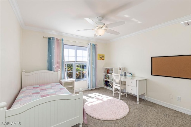 carpeted bedroom with ceiling fan and ornamental molding