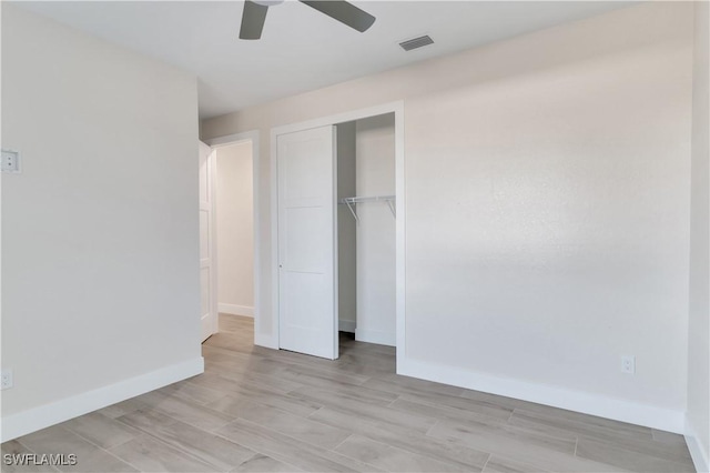 unfurnished bedroom with a closet, ceiling fan, and light hardwood / wood-style floors