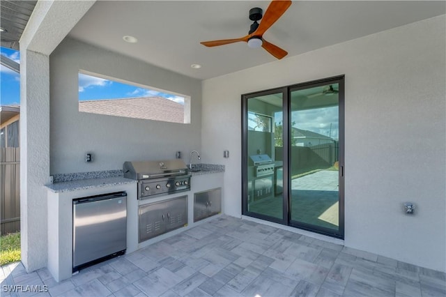 view of patio / terrace with sink and grilling area