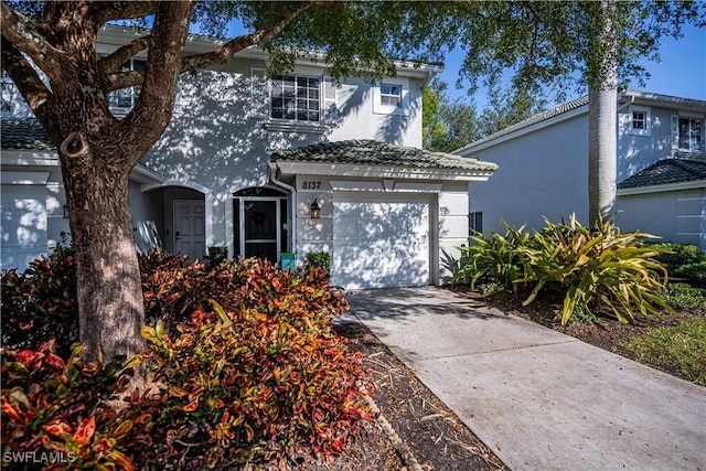 front of property featuring a garage