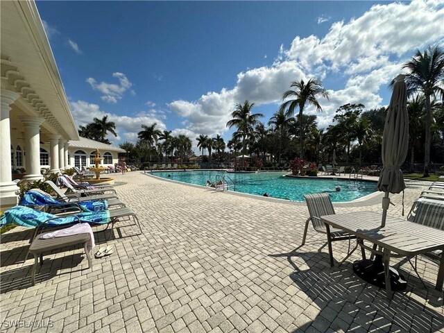 pool featuring a patio area