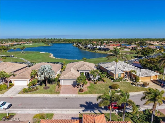 drone / aerial view featuring a water view