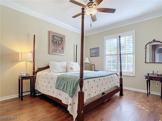 bedroom with ceiling fan, ornamental molding, and dark hardwood / wood-style floors