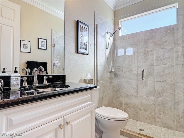 bathroom with toilet, an enclosed shower, crown molding, and vanity