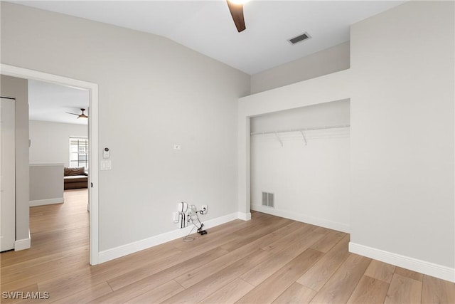 washroom with ceiling fan and light wood-type flooring