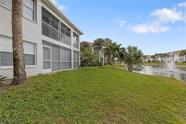 view of yard with a water view