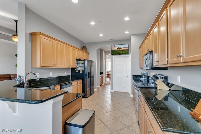 kitchen with kitchen peninsula, white dishwasher, stainless steel electric range oven, and sink