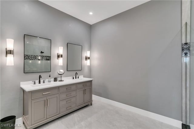 bathroom featuring vanity and a shower