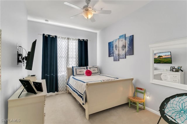 carpeted bedroom with ceiling fan