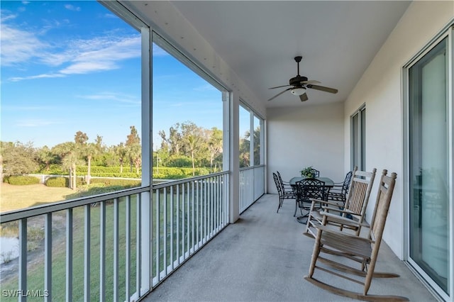 balcony featuring ceiling fan