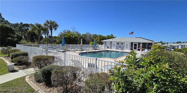 view of swimming pool with a patio