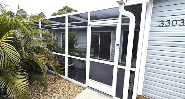 view of home's exterior with a lanai