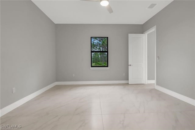 unfurnished room featuring ceiling fan