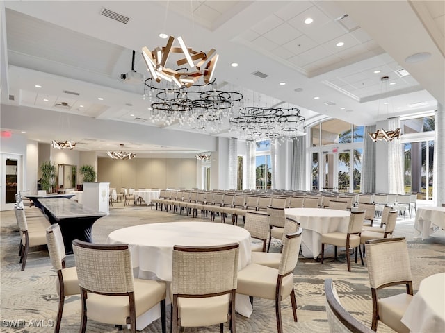 dining room featuring a high ceiling and coffered ceiling