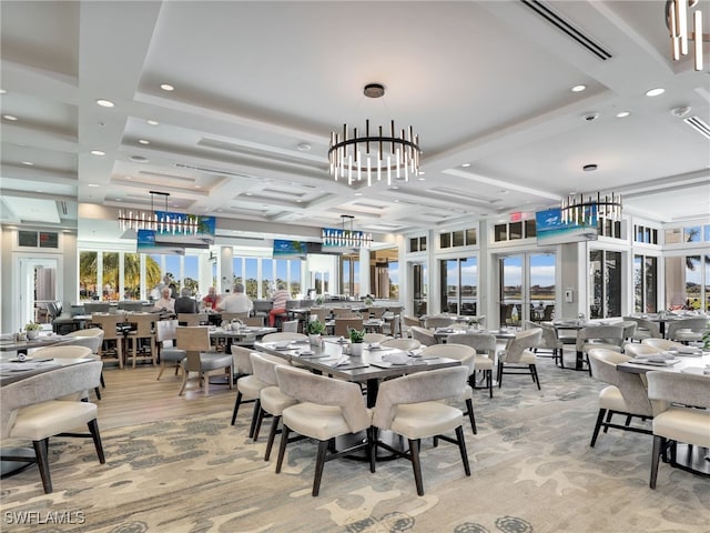 dining room with coffered ceiling and beamed ceiling