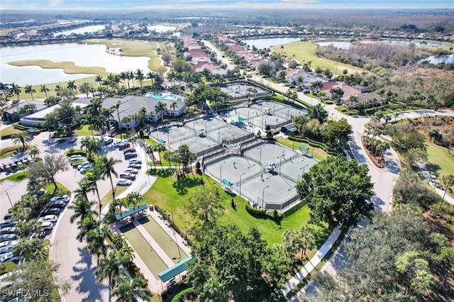 birds eye view of property with a water view