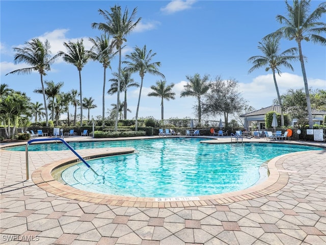 view of pool featuring a patio