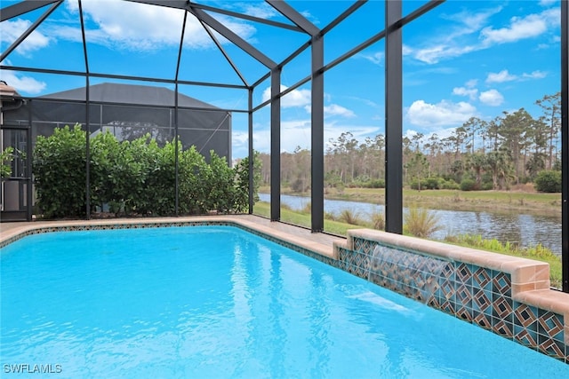 view of swimming pool with a water view, pool water feature, and glass enclosure