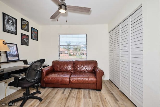 office space featuring ceiling fan and light hardwood / wood-style floors