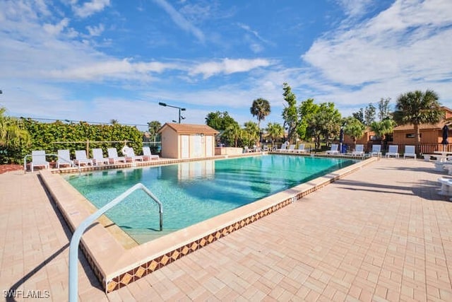 view of pool featuring a patio area