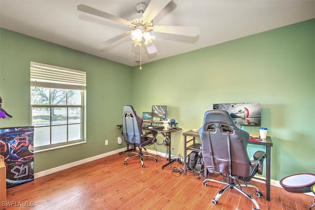 office area with ceiling fan and wood-type flooring