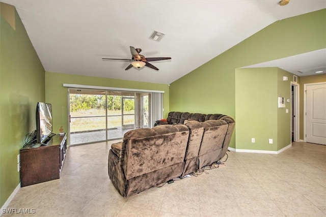 living room with ceiling fan and vaulted ceiling