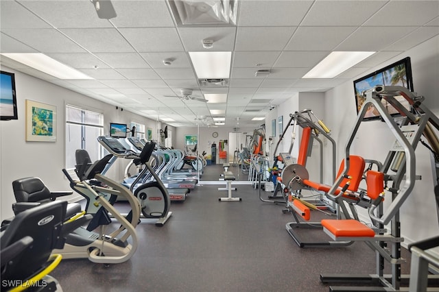 workout area featuring a paneled ceiling