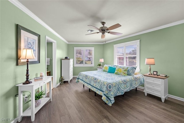 bedroom featuring hardwood / wood-style floors, ceiling fan, and crown molding