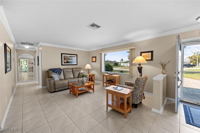 living room featuring light tile patterned flooring and crown molding