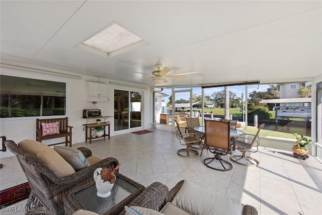 sunroom / solarium with ceiling fan