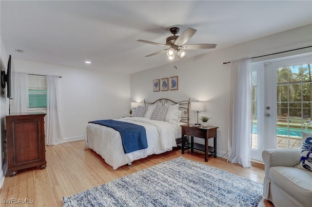 bedroom featuring ceiling fan, access to outside, and light hardwood / wood-style floors