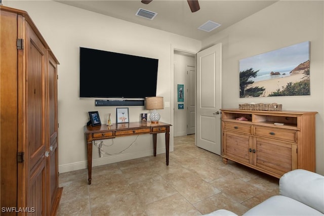 living room with ceiling fan