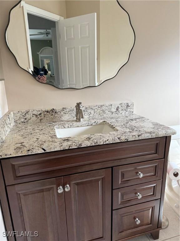 bathroom featuring vanity and tile patterned flooring