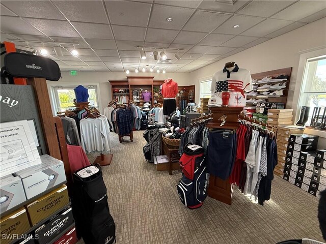 miscellaneous room featuring carpet floors and a drop ceiling