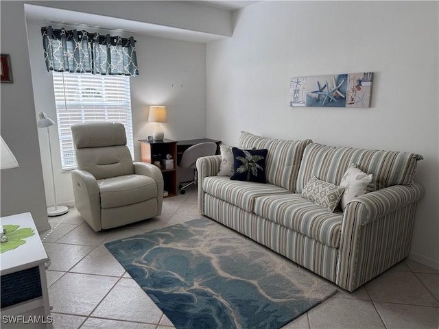 living room with tile patterned flooring