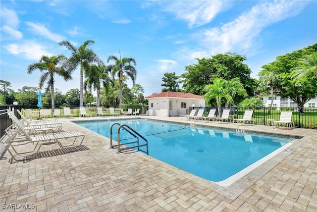 view of pool featuring a patio