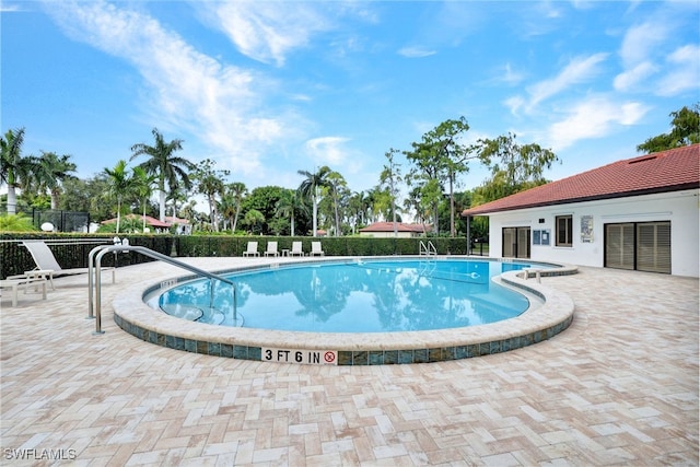 view of pool with a patio area