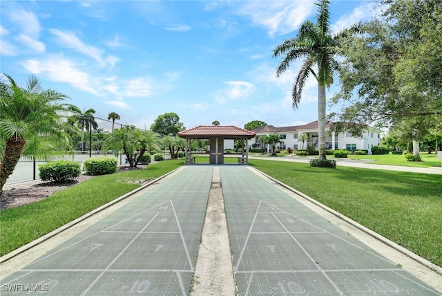 view of home's community with a gazebo and a yard