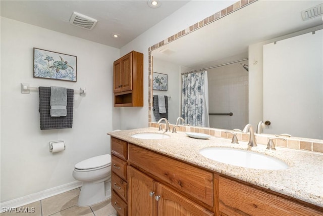 bathroom with tile patterned floors, vanity, toilet, and a shower with curtain